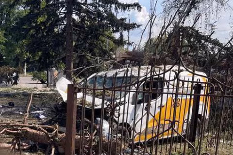 A crushed van. 
